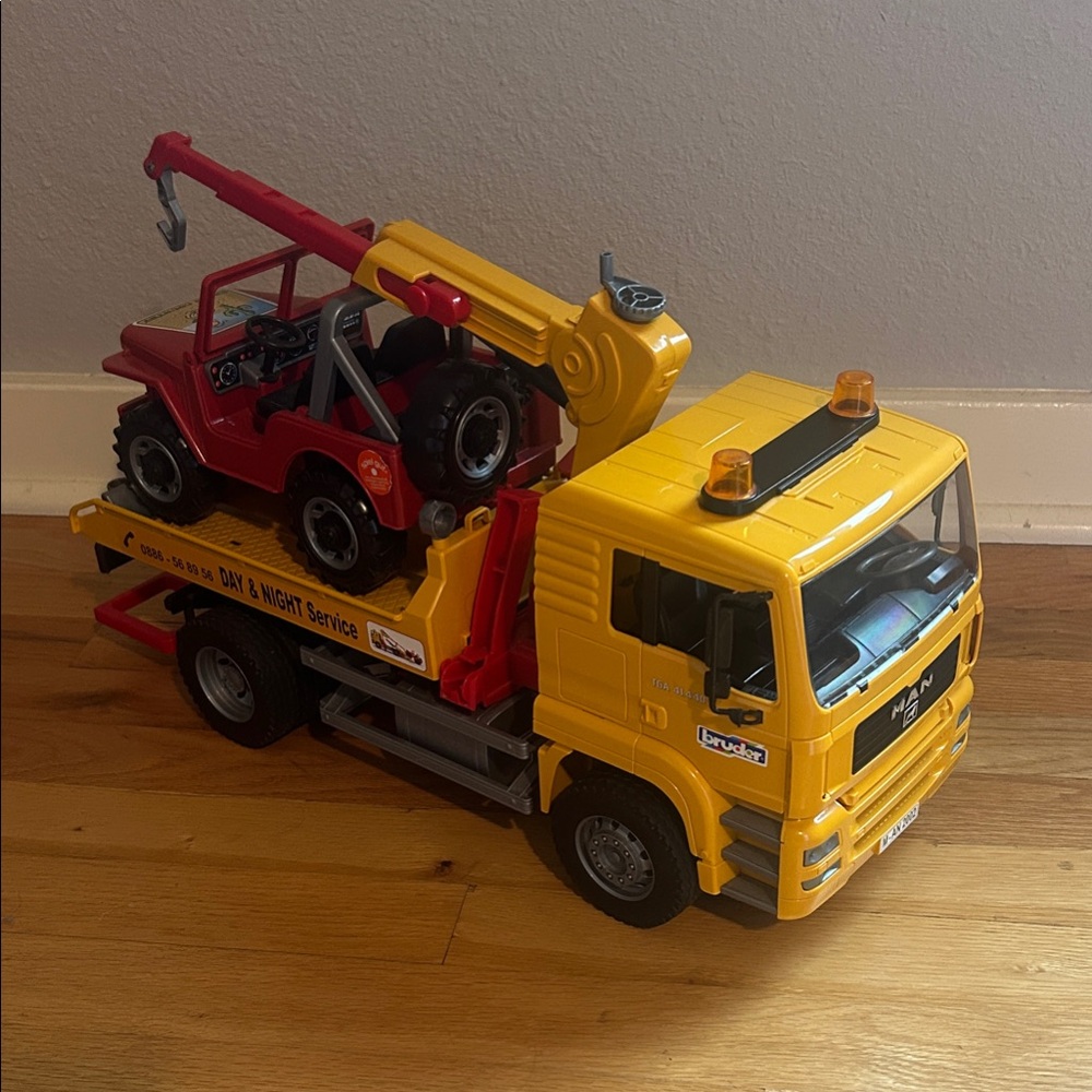 Bruder Man TGA Tow Truck with Off-Road Vehicle